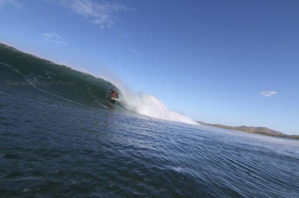 Author, Ryan Waldron, threading the needle on a Tamarindo Drainer.  Photo - Guanacaste Surf Photos