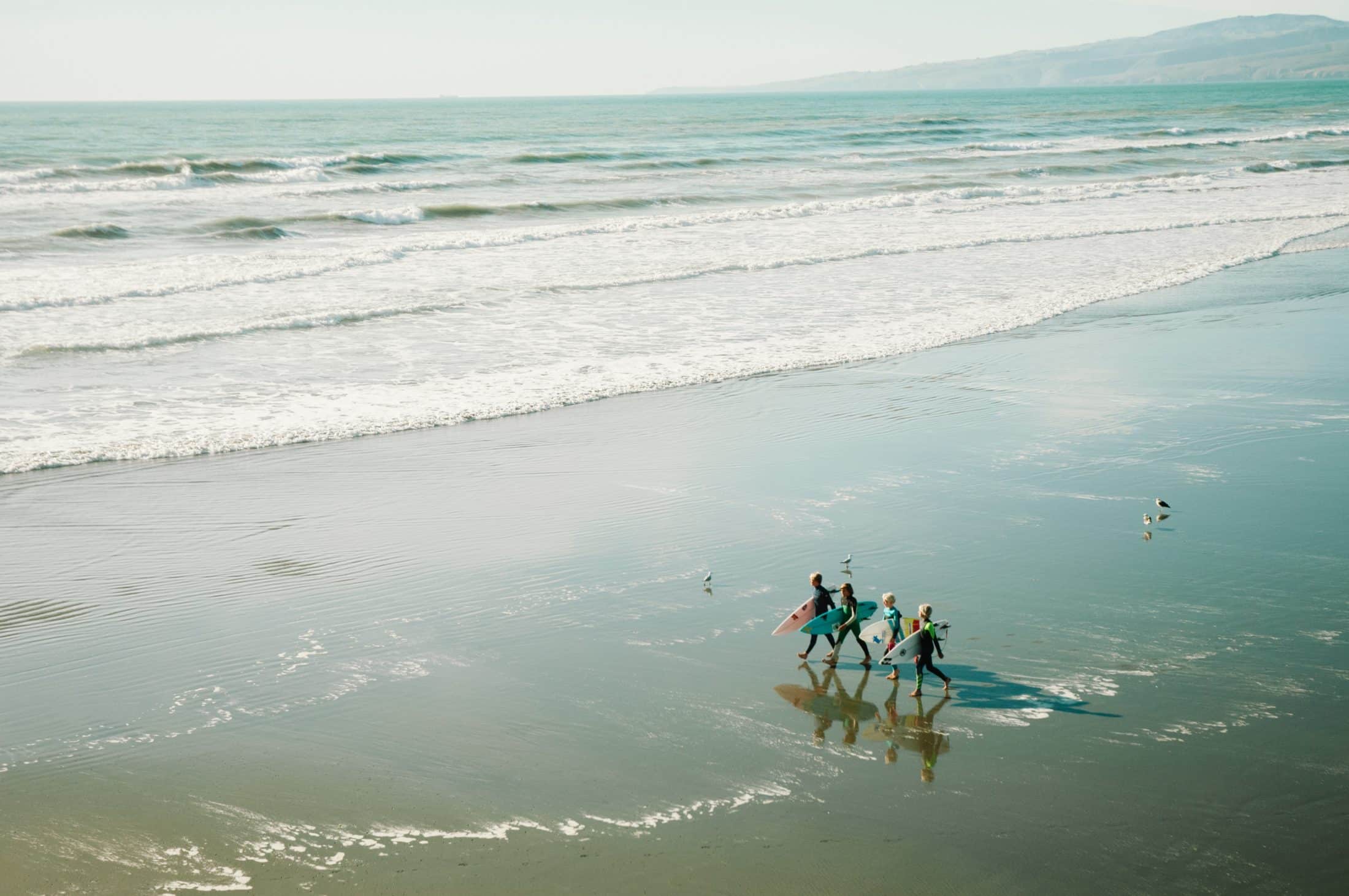 Read more about the article How to Pack for a Surf Vacation with Kids