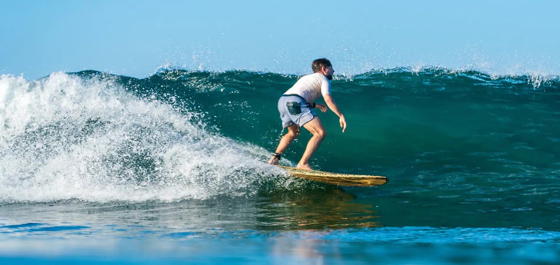 Costa Rica Surf Camp Vacations. Surfing down the line at the Tamarindo beach break, Costa Rica